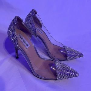 Silver studded clear high heeled shoes
